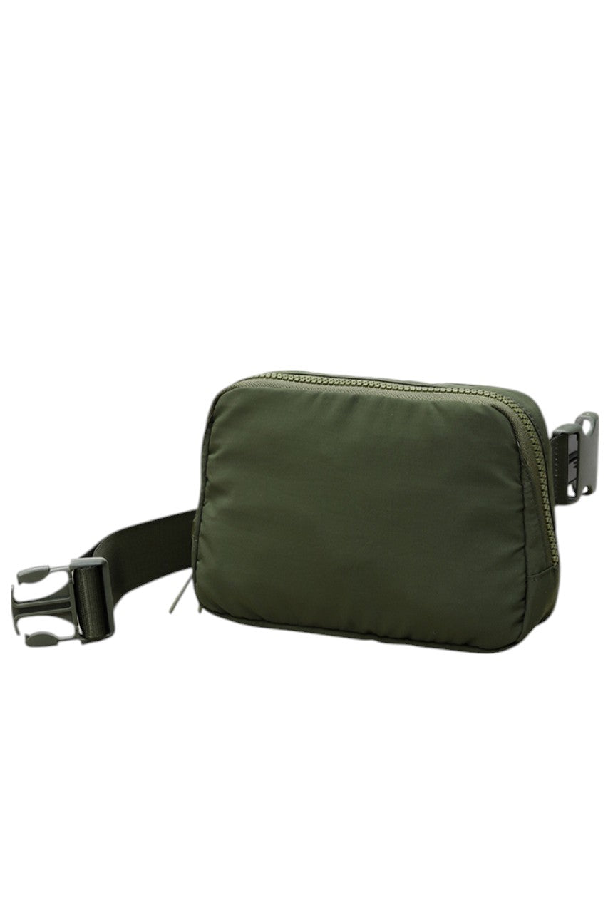 Solid Mini Fanny Belt Bag offers a compact and practical solution for hands-free carrying. Designed with durability and convenience in mind, its streamlined silhouette fits essentials securely while complementing a variety of styles. Ideal for active lifestyles, this belt bag ensures easy access and comfort without bulk, making it a versatile accessory for daily use or travel. 