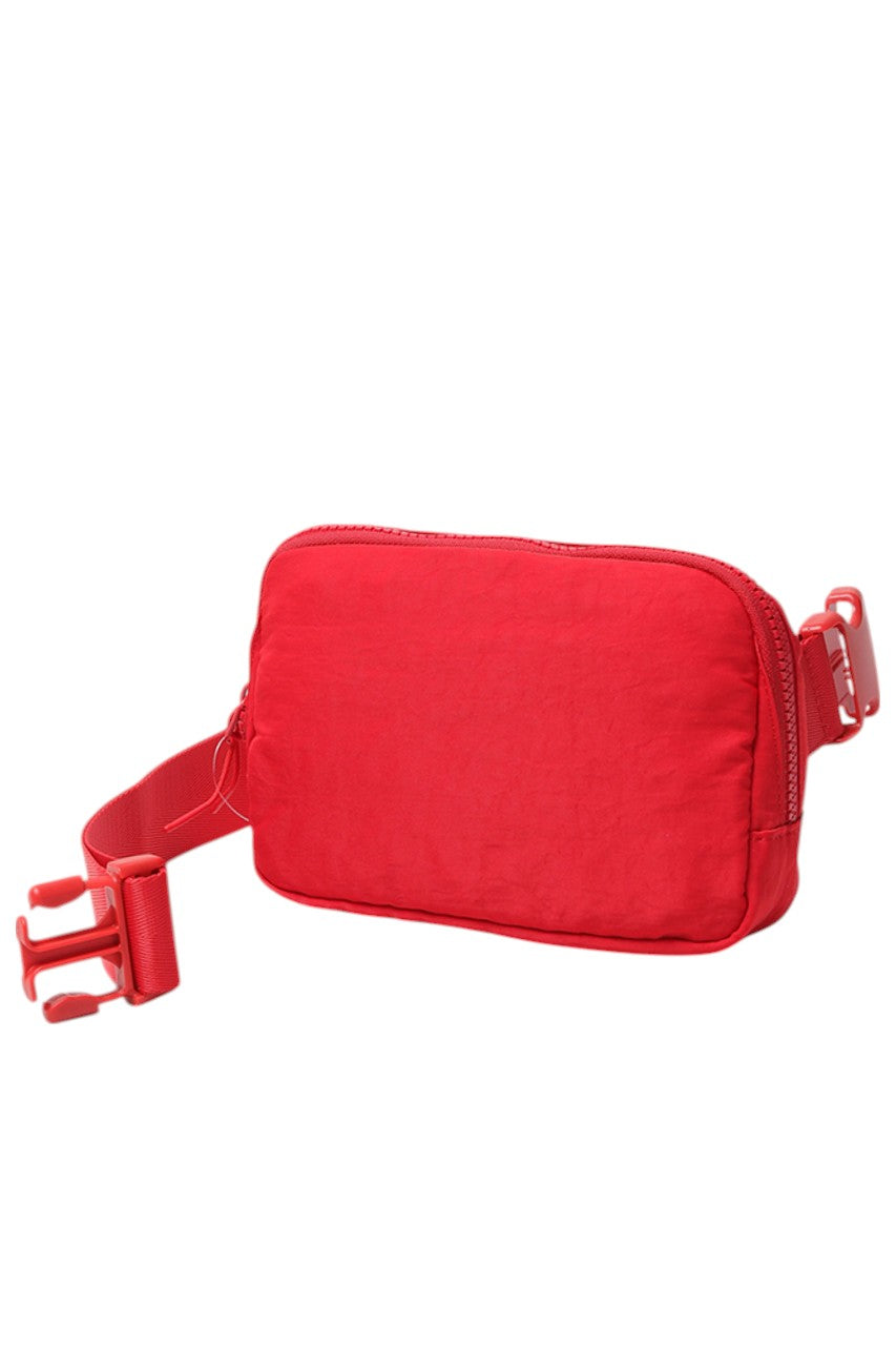 Solid Mini Fanny Belt Bag offers a compact and practical solution for hands-free carrying. Designed with durability and convenience in mind, its streamlined silhouette fits essentials securely while complementing a variety of styles. Ideal for active lifestyles, this belt bag ensures easy access and comfort without bulk, making it a versatile accessory for daily use or travel. 