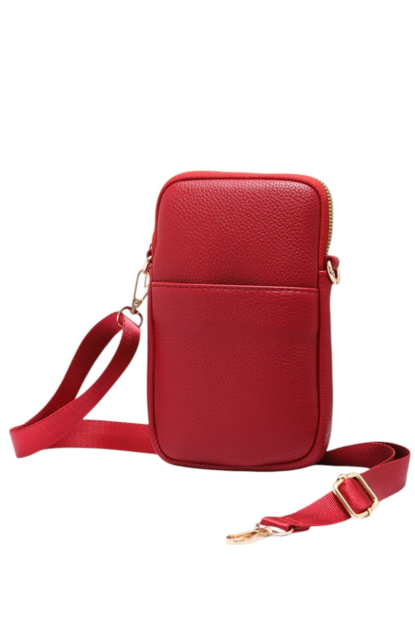 Solid PU Cell Phone Strap Bag offers a sleek and durable solution for carrying your phone hands-free. Crafted from high-quality PU leather, it combines style with practicality, providing secure storage and easy access. The adjustable strap ensures a comfortable fit, making it ideal for daily use or travel. Its minimalist design complements any outfit while protecting your device from scratches and minor impacts. Perfect for those seeking convenience without compromising on elegance. 