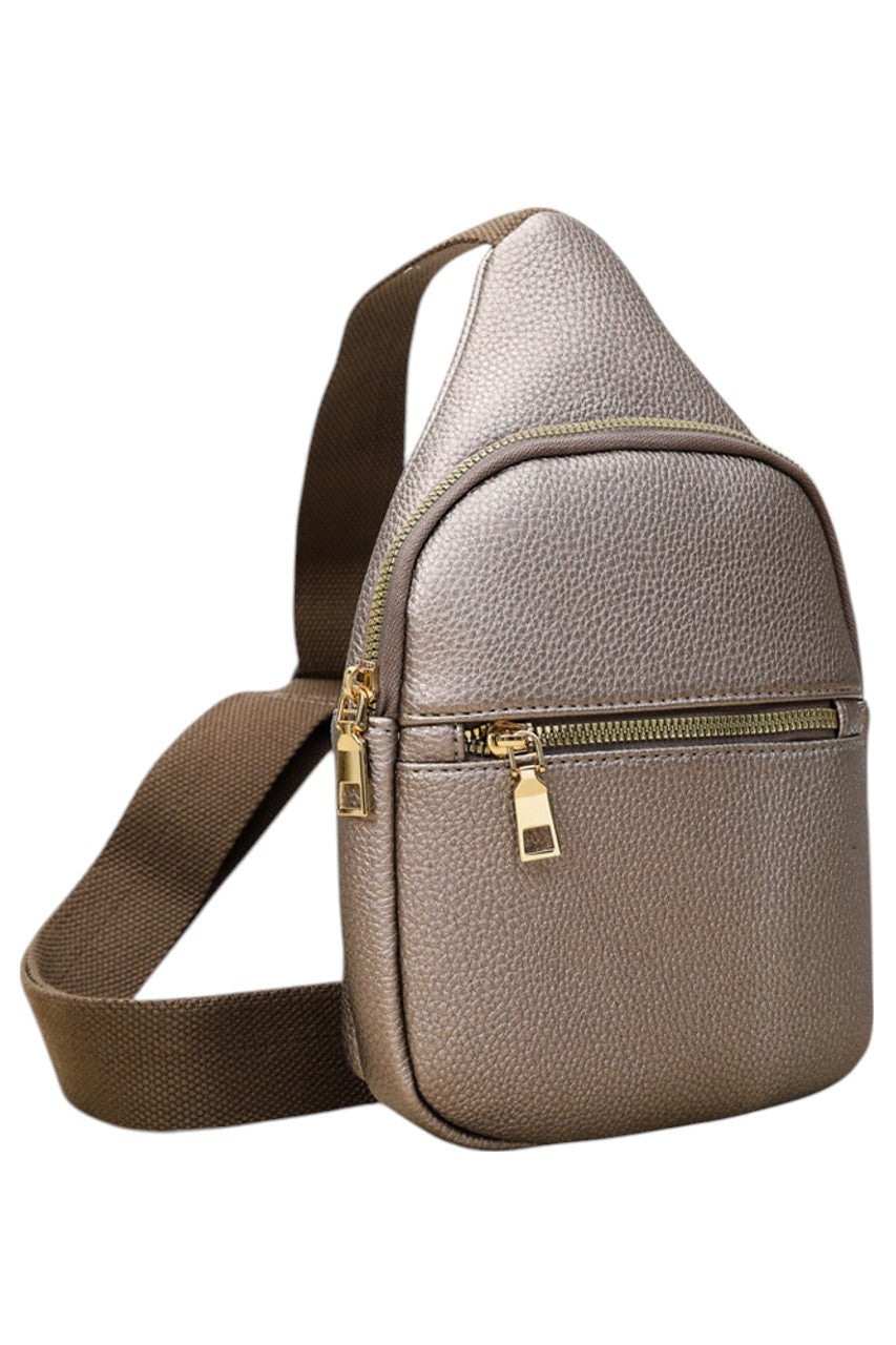 Solid PU Sling Bag combines durability with sleek design, crafted from high-quality polyurethane for a lightweight yet sturdy feel. Its compact size and adjustable strap offer comfortable, hands-free carrying, making it ideal for daily use or travel. The bag’s minimalist style ensures versatility, complementing various outfits while securely holding essentials. Perfect for those seeking a practical and stylish accessory with expert craftsmanship.