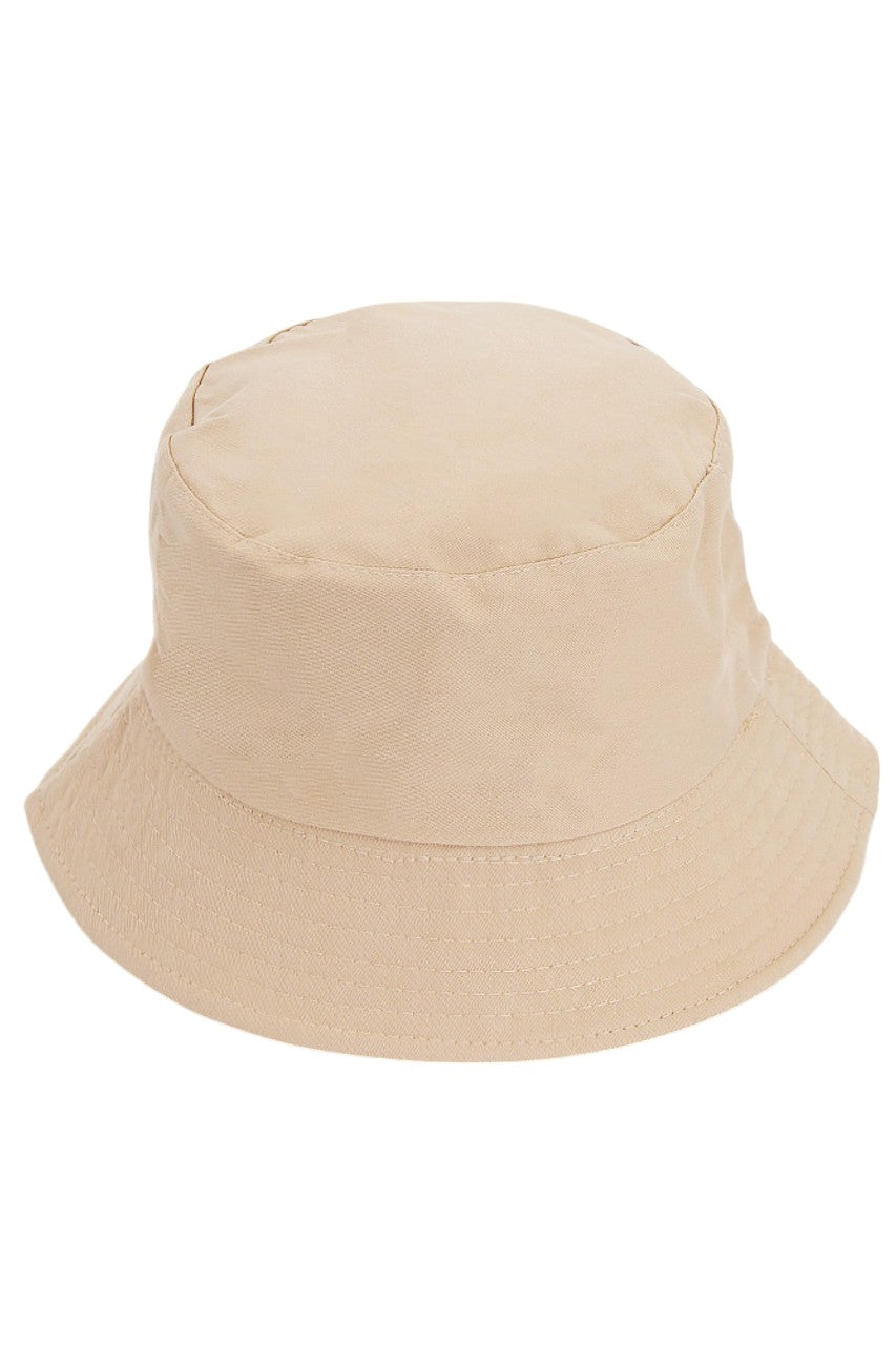 Khaki Solid reversible bucket hat exemplifies advanced headwear design through its dual-functionality construction. Fabricated with high-tensile materials, it provides comprehensive UVA/UVB protection while maintaining dimensional stability throughout extended wear cycles. The precisely calibrated brim curvature ensures optimal facial shading without compromising peripheral awareness, while the strategically positioned interior band delivers pressure-distributed comfort. Enhanced with moisture-wicking techn