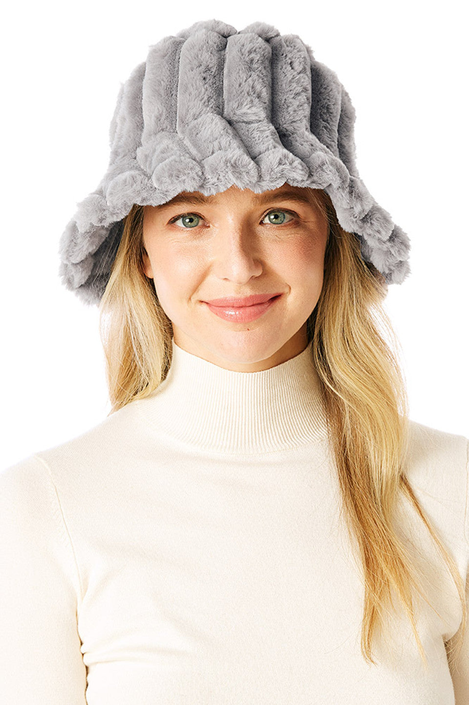 Gray SOLID SOFT FAUX FUR BUCKET HAT is designed to keep you warm and stylish. Crafted from ultra-soft faux fur, it offers a plush feel and a trendy silhouette. The classic bucket shape ensures a comfortable fit while adding texture to your outfit. A go-to choice for chilly weather, it blends fashion and function effortlessly. 