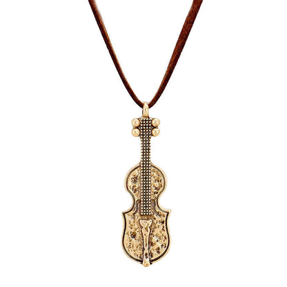 Gold Suede Metal Guitar Pendant Necklace, Get ready with these Metal Guitar Pendant Necklace, put on a pop of color to complete your ensemble. Perfect for adding just the right amount of shimmer & shine and a touch of class to special events. Perfect Birthday Gift, Anniversary Gift, Mother's Day Gift, Graduation Gift.