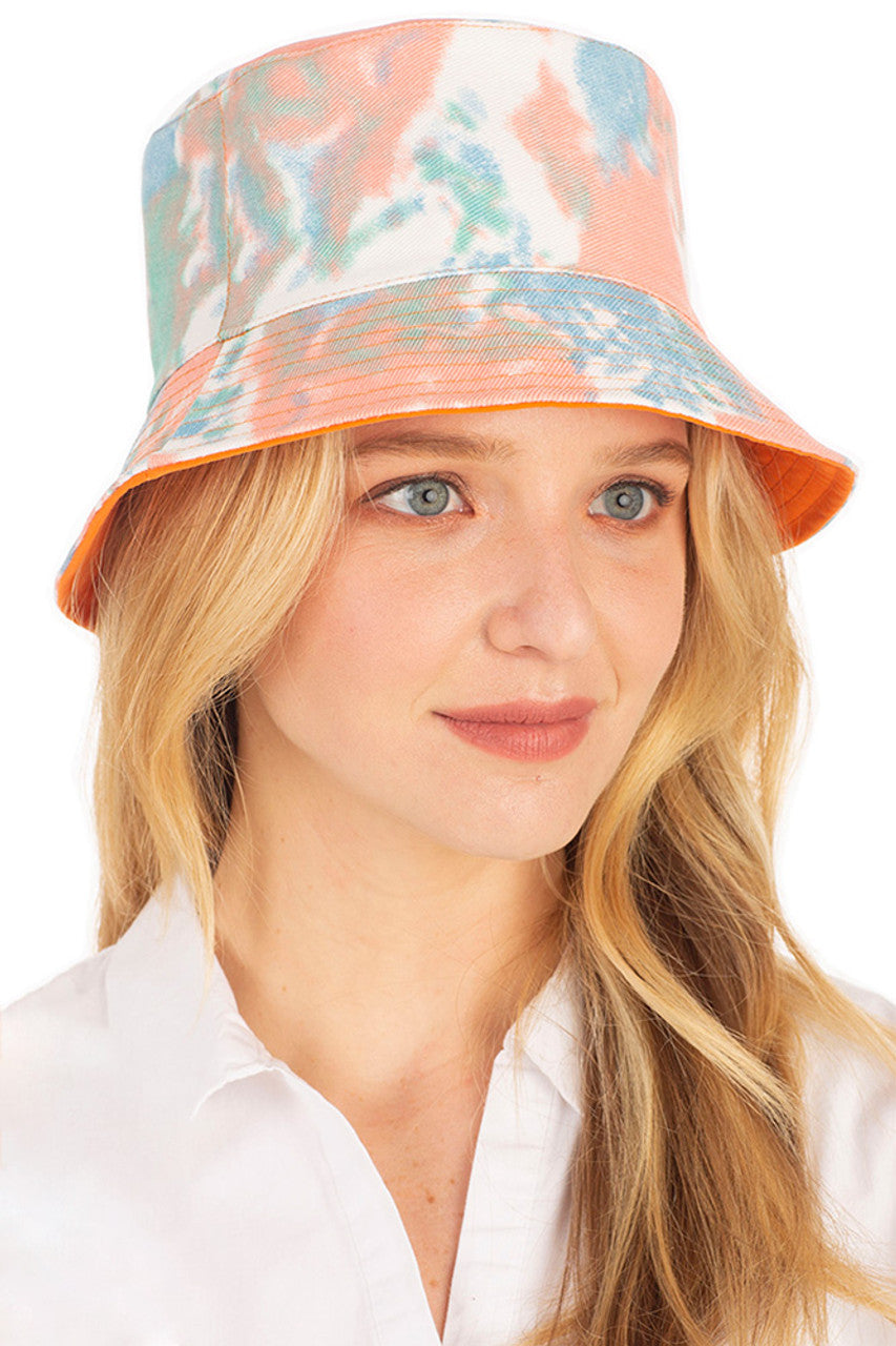 Orange TIE DYE REVERSIBLE BUCKET HAT features vibrant tie-dye patterns that deliver two distinct looks in one versatile accessory. Constructed with premium materials for durability, it provides effective sun protection while making a bold fashion statement. Perfect for festivals, beach outings, or adding a touch of artistic flair to everyday ensembles. 