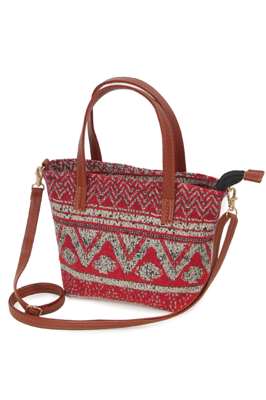 Red Tribal Print Crossbody Bag combines cultural artistry with practical design. Crafted with durable materials, it features a vibrant tribal pattern that enhances any ensemble. Its adjustable strap and compact size provide comfortable, hands-free convenience, making it ideal for daily use or travel. This bag offers secure storage for essentials while adding a distinctive, expert touch to your accessory collection. 