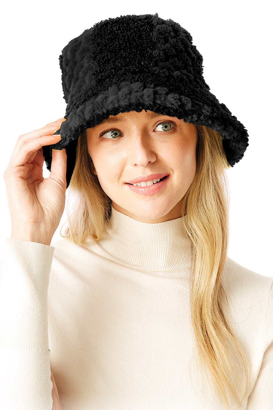 Black Two Tone Faux Fur Bucket Hat combines luxurious texture with contemporary design. The dual-color pattern adds visual dimension, while premium faux fur construction ensures warmth without compromising on ethical standards. The classic bucket silhouette offers practical coverage with a fashion-forward edge, making it an essential accessory for elevating winter wardrobes.