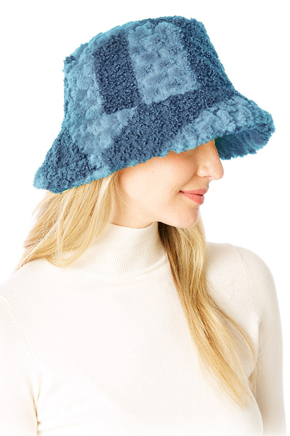 Blue Two Tone Faux Fur Bucket Hat combines luxurious texture with contemporary design. The dual-color pattern adds visual dimension, while premium faux fur construction ensures warmth without compromising on ethical standards. The classic bucket silhouette offers practical coverage with a fashion-forward edge, making it an essential accessory for elevating winter wardrobes.