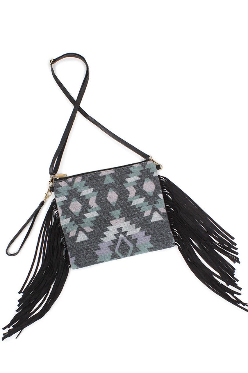 Gray Western Tassel Crossbody Bag combines classic western style with practical design. Crafted for durability and ease of use, it features a secure crossbody strap for hands-free convenience and decorative tassels that add a distinctive flair. Ideal for everyday wear, this bag offers ample space for essentials while maintaining a stylish, rugged look that complements a variety of outfits. 