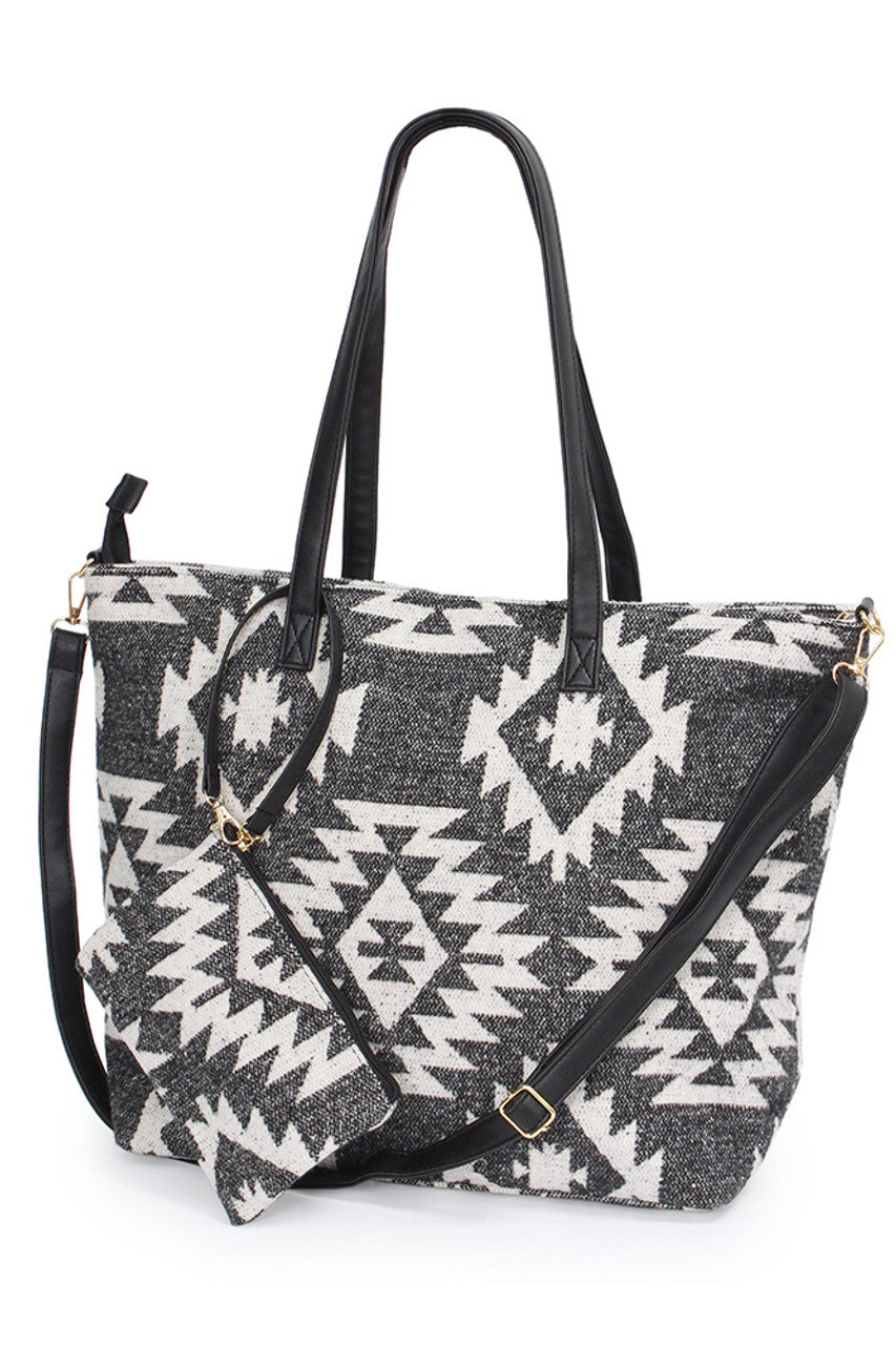 Western Weekend Tote Bag with Pouch combines spacious design with practical organization, making it ideal for short trips or daily use. Crafted for durability, this tote features a roomy main compartment complemented by a detachable pouch to keep essentials easily accessible. Its sturdy construction and versatile style ensure reliable performance and a polished look for any weekend getaway. 