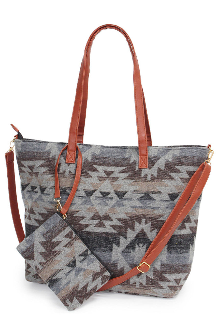 Western Weekend Tote Bag with Pouch combines spacious design with practical organization, making it ideal for short trips or daily use. Crafted for durability, this tote features a roomy main compartment complemented by a detachable pouch to keep essentials easily accessible. Its sturdy construction and versatile style ensure reliable performance and a polished look for any weekend getaway. 