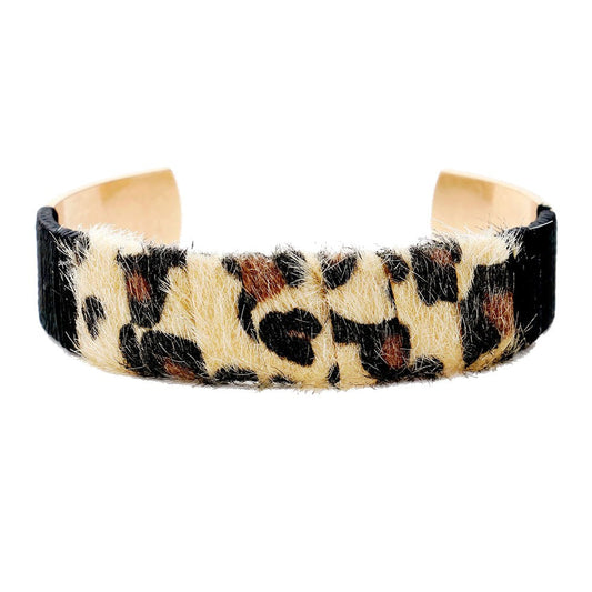 Wrapped Leopard Print Texture Faux Leather Gold-Toned Cuff Bracelet, one of the hottest trends right now, you can rock it with this bracelet! Accent your favorite outfit with this beautiful cuff and coordinate it with any ensemble from business casual to everyday wear. Brown, Leopard, Worn Gold; Size : 0.50" H; Cuff