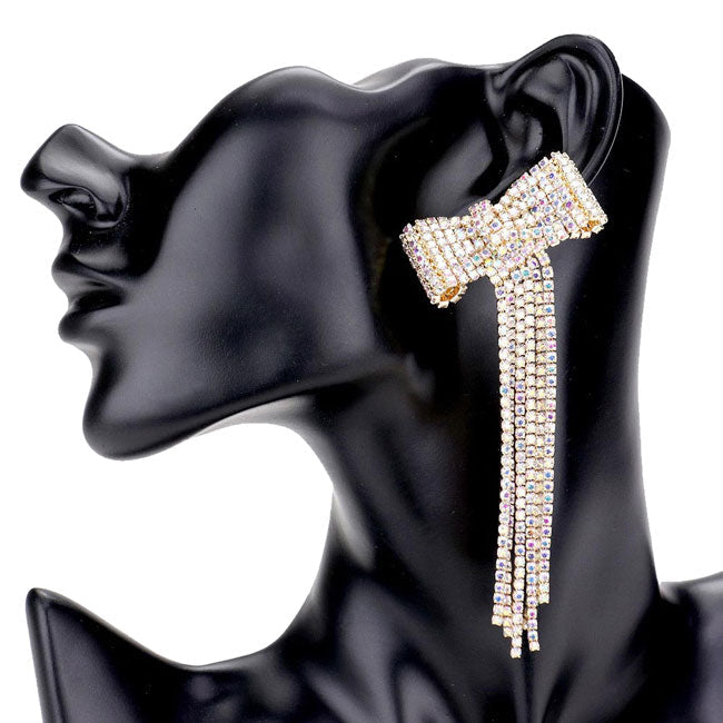 AB Gold Bow Accented Rhinestone Long Drop Evening Earrings. Elegance becomes you in these lightweight and playful, shiny glamorous Rhinestone earrings, the perfect sparkling accessory to add some sophisticated fun to your next social event. Coordinate this evening earrings with any ensemble from business casual wear, the perfect addition to every outfit.