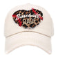 Beige Baseball Babe Leopard Patterned Heart Vintage Baseball Cap. Fun cool message themed vintage baseball cap. Perfect for walks in sun, great for a bad hair day. The distressed frayed style with faded colour gives it an awesome vintage look. Soft textured, embroidered message with fun statement will become your favourite cap.