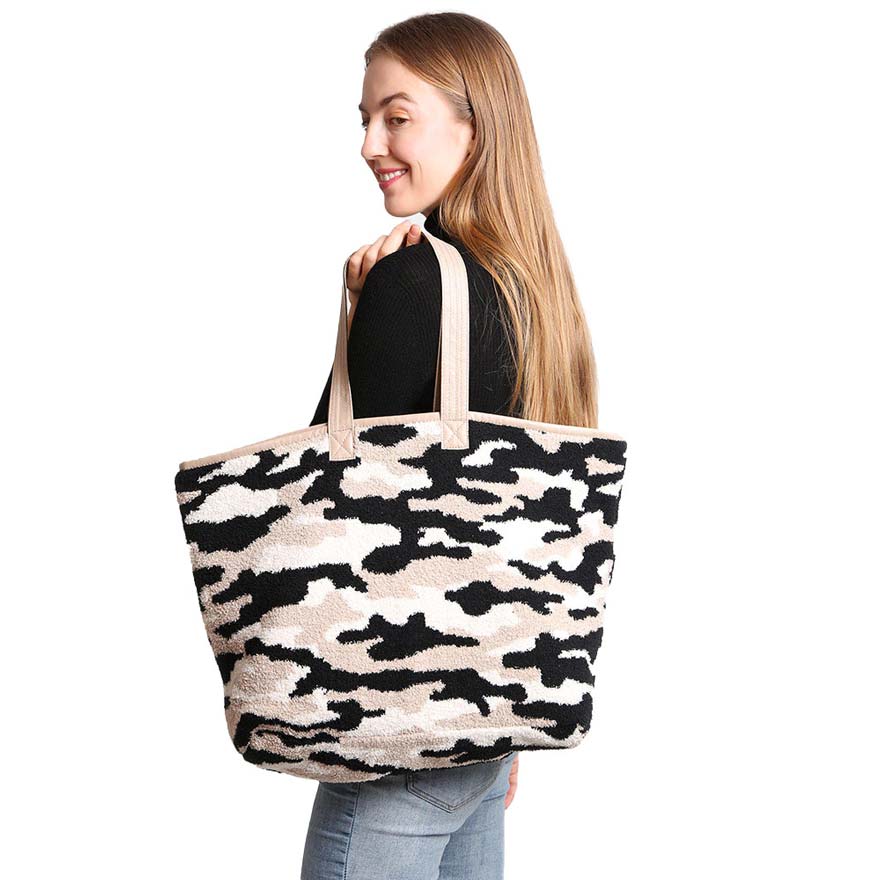 Beige Camouflage Tote Bag, be gorgeous and make an individual statement of fashion with this beautiful tote bag. It will be your new favorite accessory to hold onto all your items altogether in one place. The top zipper keeps everything secure and safe. It's easy to carry, and lightweight to run errands or a night out on the town. It's an excellent gift for Birthdays, holidays, Christmas, New Year, etc. for your friends, family, and the persons you love and care for. Keep yourself gorgeous and trendy!