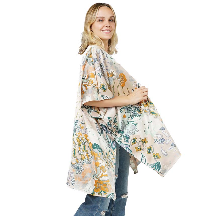 Beige Floral Patterned Satin Cover Up Kimono Poncho, this beautiful floral-patterned Poncho is made of soft and breathable material that amps up your real and gorgeous look with a perfect attraction everywhere. Its eye-catchy design makes you stand out every time. Coordinate this cover-up kimono with any ensemble to finish in perfect style and get ready to receive beautiful compliments.