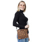 Beige Leopard Print Tassel Crossbody Clutch Bag. Be the ultimate fashionista carrying this trendy tassel crossbody clutch bag! great for when you need something small to carry or drop in your bag. perfect for the festive season, embrace the Leopard themed spirit with these bag, these pretty  gift Crossbody Bags are sure to bring a smile to your face.