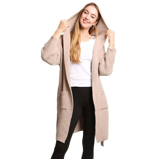 Beige Solid Color Hooded Robe, is beautifully designed with a variety of colors. Perfect for after stepping out of the shower or just to wear whilst getting ready for the day. This cozy robe fits easily. The adjustable belt helps for quick adjustment and gives a perfect snug fit every time. It's not only luxurious and highly durable but super comfortable to wear as well.  Comfortable, stylish, and practical that a woman could ask for in a robe. 
