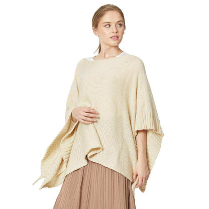 Beige Yarn Knitted Poncho, is luxurious and trendy that embellishes your beauty to a greater extent. It's a super soft chic capelet that keeps you warm, toasty and so comfortable in cold days and winter. You can throw it on over so many pieces elevating any casual outfit! Perfect Gift for Wife, Mom, Birthday, Holiday, Christmas, Anniversary, Fun Night Out. Stay luxurious and comfortable!