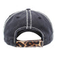 Black Baseball Babe Leopard Patterned Heart Vintage Baseball Cap. Fun cool message themed vintage baseball cap. Perfect for walks in sun, great for a bad hair day. The distressed frayed style with faded colour gives it an awesome vintage look. Soft textured, embroidered message with fun statement will become your favourite cap.