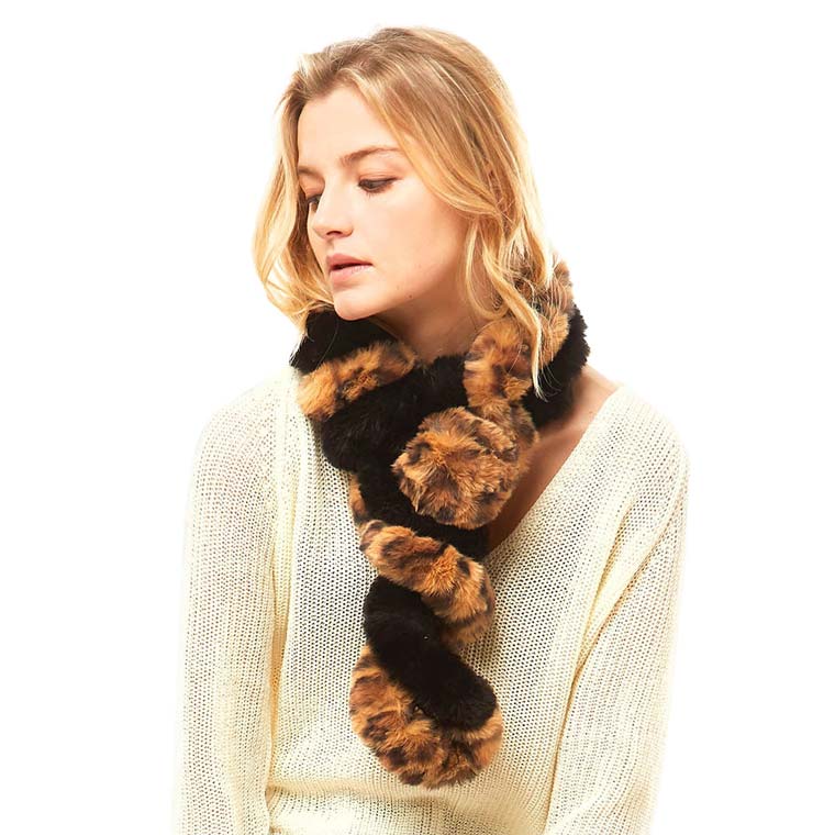 Black Brown Leopard Faux Fur Twisted Pull Through Scarf, is nicely printed with two color style that makes your beauty more enriched with perfect attraction. Great to wear daily in the cold winter to protect you against the chill. It accents the glamour with a plush material that feels amazing and snuggled up against your cheeks. This scarf is a versatile choice that can be worn in many ways. A beautiful gift for your Wife, Mom, and your beloved ones on their birthdays or any other occasion.