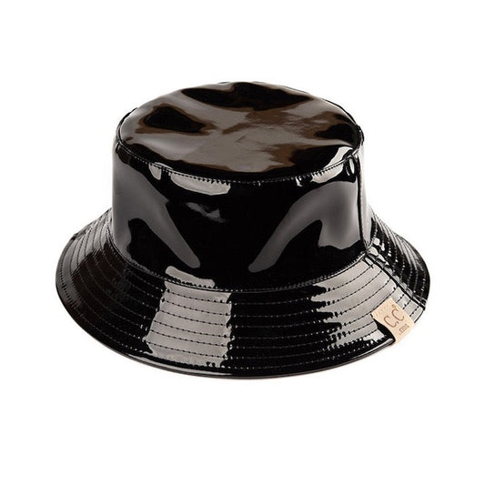 Black C.C Kids Shiny Solid Color Reflective Enamel Detailed Rain Bucket Hat; this rain hat is snug on the head and works well to keep rain off the head, out of the eyes, and also the back of the neck. Wear it to lend a modern liveliness above a raincoat on trans-seasonal days in the city. Perfect Gift for that fashion-forward friend