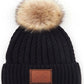 Black C.C Double Braided Beanie Faux Fur Pom Pom & Leather Patch Winter Hat; reach for this classic toasty hat to keep you nice n warm in the chilly winter weather, the wintry touch finish to your outfit. Perfect Gift Birthday, Christmas, Holiday, Anniversary, Stocking Stuffer, Secret Santa, Valentine's Day, Loved One, BFF