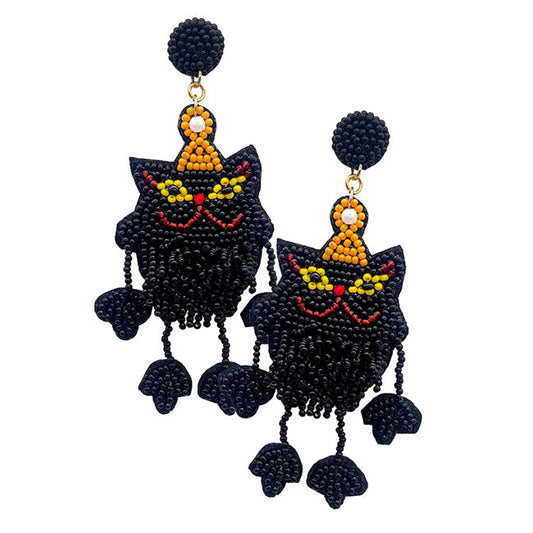Haunt the night with these purr-fect Halloween Black Cat Beaded Dangle Earrings! Adorned with beaded details, these earrings will make any costume complete with a spooky flair. Meow!