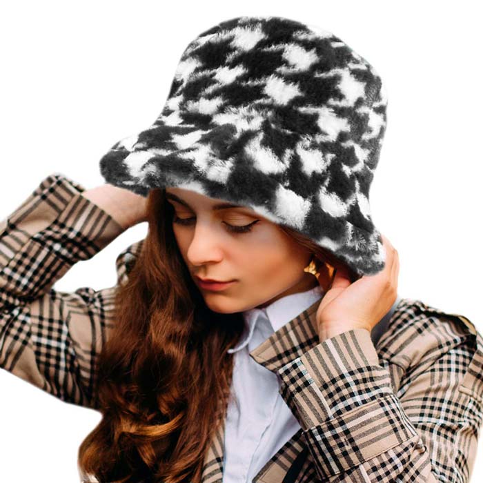 Black Houndstooth Patterned Faux Fur Bucket Hat, This Faux Fur bucket hat is nicely designed and a great addition to your attire. Have fun and look stylish anywhere outdoors. Great for covering up when you are having a bad hair day. Perfect for protecting you from the wind, snow, beach, pool, camping, or any outdoor activities in cold weather. This classic style is lightweight and practical, perfect for all occasions at lunches, picnics, evening dinner parties or barbeques.