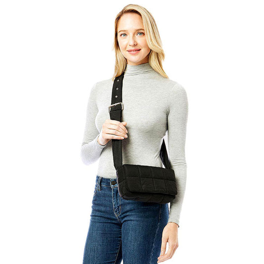 Black Quilted Puffer Crossbody Bag, Complete the look of any outfit on all occasions with this Shiny Puffer Crossbody. These bags offer enough room for your essentials. With a One Inside Zipper Pocket, three two inside slip pockets and a secured Magnetic Closure at the top, this bag will be your new go to! These beautiful and trendy Crossbody have adjustable hand straps that make your life more comfortable. Casual Easy style using for: Work, School, Excursion, Going out, Shopping, Party, etc.