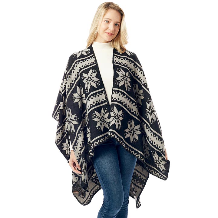 Black Reversible Snowflake Pattern Ruana, enrich your beauty with confidence with this nicely knitted poncho. You can stand out with the contrast of different outfits. Snowflake patterned with beautiful design gives a unique decorative and attractive modern look that makes your day with memorable moments. Match perfectly with jeans and T-shirts or a vest. Absolutely a stylish eye-catcher and will become one of your favorite accessories quickly.