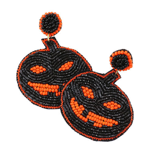 Black Seed Bead Pumpkin Earrings. Share the spirit of Halloween with our extra spooky Felt Back Seed Beaded Pumpkin Dangle Earrings. These Earrings are made to scare people off! Halloween is the time of year where there is magic in the night when pumpkins glow with candlelight. Just the thing you need to perfect your Halloween costume! Let the spooky season begin! Happy Halloween!