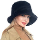 Black Trendy & Fashionable Winter Faux Fur Solid Bucket Hat. Before running out the door into the cool air, you’ll want to reach for this toasty beanie to keep you incredibly warm. Accessorize the fun way with this beanie hat, it's the autumnal touch you need to finish your outfit in style. Awesome winter gift accessory!