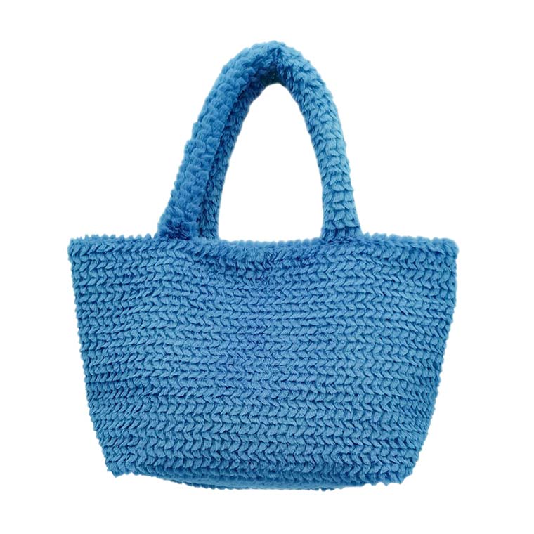 Blue Fuzzy Fur Tote Bag, is a cute and beautiful mini tote bag that enriches your accessory collection and amps up your outlook with beautiful color variations. It perfectly goes with any outfit in any style. Easy to carry and keep your handy items safe and secure. Nice color variation gives you the opportunity to match the tote up with any ensemble, any time, and anywhere. An excellent gift for your near and dear ones. Have a cute look with this fuzzy fur tote!