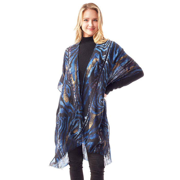 Blue Mixed Animal Printed Gold Foil Accented Ruana Poncho, on-trend & fabulous design make it eye-catching and beautiful. It will keep you cozy and comfortable on winter and cold days. Go outside with confidence and beauty with this animal-designed ponchos. It's a luxe addition to any cold-weather ensemble. Great for daily wear in the cold winter to protect you against the chill.