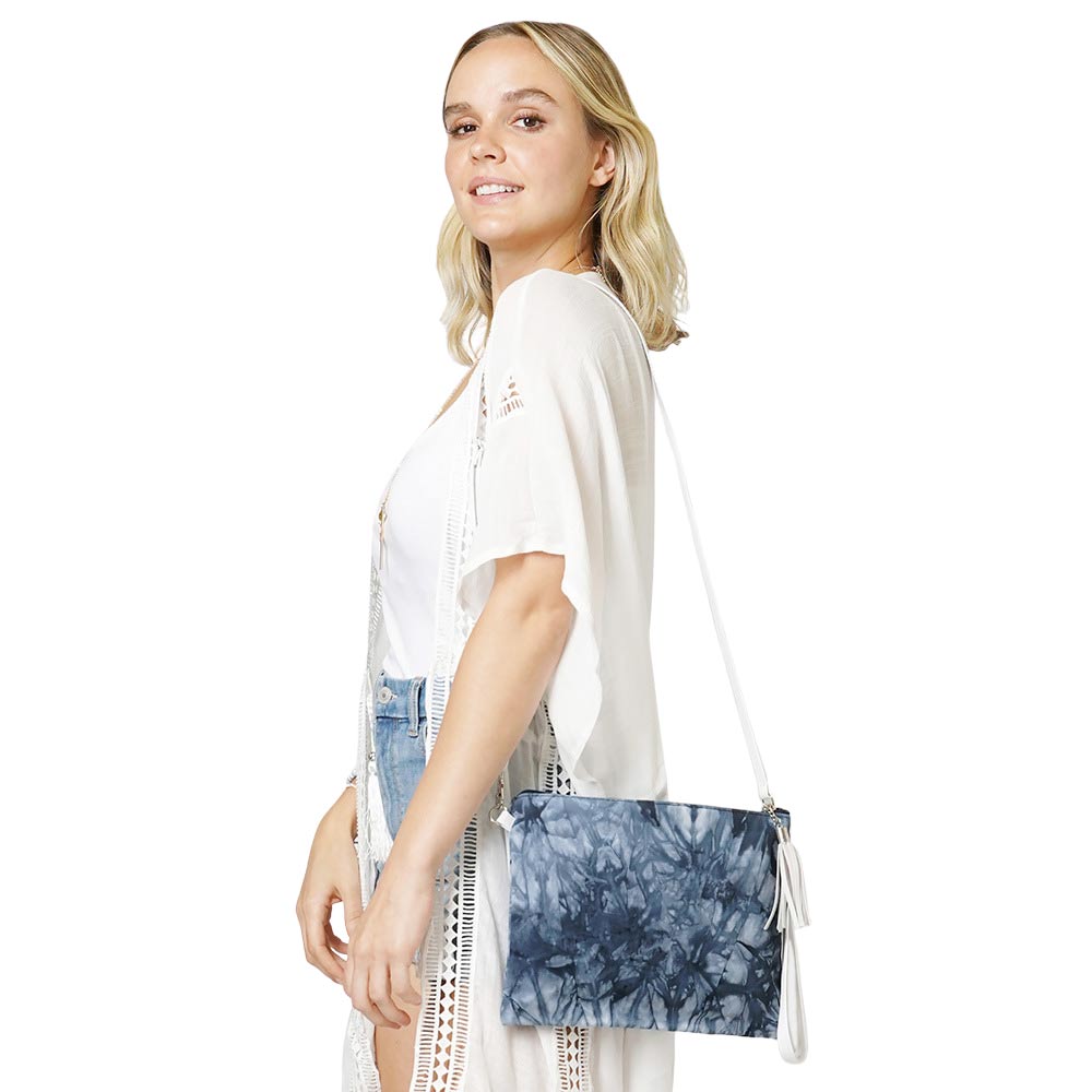 Blue Tie Dye Wristlet Clutch Crossbody Bag, comes with attached and detached straps to ensure easy carrying and comfort. It looks like the ultimate fashionista while carrying this trendy wristlet crossbody clutch bag! Easy to carry especially when you need hands-free and lightweight to run errands or a night out on the town. It will be your new favorite accessory to hold onto all your necessary items. An excellent gift item for birthdays, holidays, Christmas, new Year, etc.