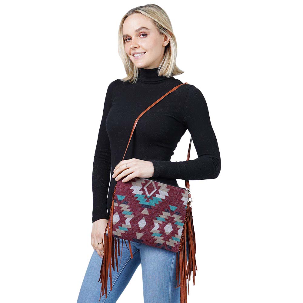 Burgundy Western Pattern Tassel Crossbody Clutch Bag, come with beautiful tassels on both sides to give you a dashing look. These western patterned bags are fit for all occasions and places. Its catchy and awesome appurtenance drags everyone's attraction to you. It is a perfect gift for birthdays, holidays, Christmas, New year, graduation, etc. These beautiful and trendy bags have adjustable and detachable hand straps that make your life more comfortable.