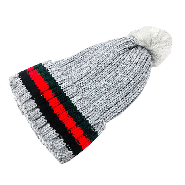 Gray Color Block Knit Pom Pom Beanie Hat. before running out the door into the cool air, you’ll want to reach for this toasty beanie to keep you incredibly warm. Accessorize the fun way with this pom pom hat, it's the autumnal touch you need to finish your outfit in style. Awesome winter gift accessory!