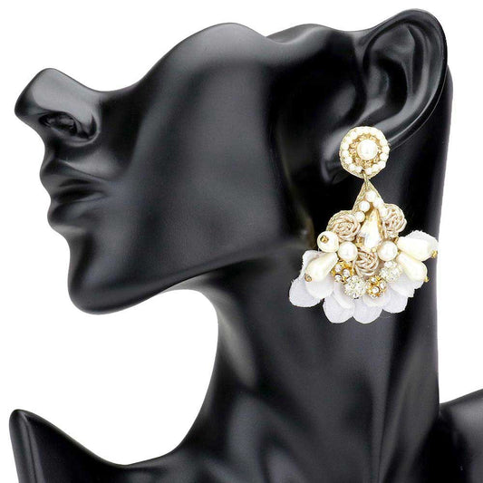 Cream Stone Pearl Embellished Fabric Sprout Fringe Dangle Earrings. These gorgeous Stone Pearl pieces will show your class in any special occasion. The elegance of these Stone Pearl goes unmatched, great for wearing at a party! Perfect jewelry to enhance your look. Awesome gift for birthday, Anniversary, Valentine’s Day or any special occasion.