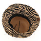 Dark Natural C.C Zebra Print Cloche Straw Bucket Hat. Keep your styles on even when you are relaxing at the pool or playing at the beach. Large, comfortable, and perfect for keeping the sun off of your face, neck, and shoulders Perfect summer, beach accessory. Ideal for travelers who are on vacation or just spending some time in the great outdoors.