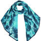 Deep Teal Sea Green C C Tie Dye Bias Cut Scarf With Rubber Patch, add a beautiful look and touch of perfect class to your outfit in style. Nicely designed with tie dye that gives a unique and awesome appearance with comfort and warmth. Perfect weight makes it wearable to complement your outfit, or with your favorite fall jacket. Great for daily wear in the cold winter to protect you against the chill.