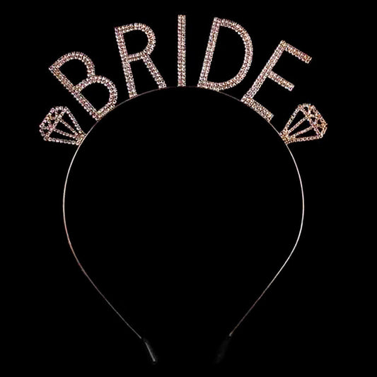 Gold Bride Rhinestone Headband. A timeless selection, Bridal Rhinestone Headband is exceptionally elegant, adding an exquisite detail to your wedding dress or tie it on your hair for a glamorous to any outfit. This headband will pair beautifully with your dress for elegant presentation. Perfect for brides, bridal parties, and any other formal occasion.