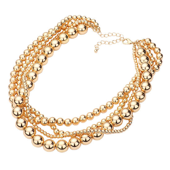 Gold Multi Layered Metal Ball Necklace. Stone Embellished Heart Metal Ball Pendant Station Necklace, Get ready with these Pendant Station Necklace, put on a pop of color to complete your ensemble. Perfect for adding just the right amount of shimmer & shine and a touch of class to special events. Perfect Birthday Gift, Anniversary Gift, Mother's Day Gift.