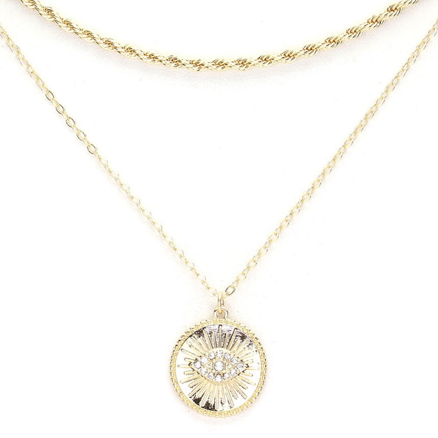 Gold Rhinestone Embellished Evil Eye Charm Round Pendant Layered Necklaces; when someone eyes your good fortune with jealousy or gluttony, the evil eye necklace is a known symbol to protect & ward off negative energy. Great gift: Vacation, Birthday, Anniversary, Christmas, Just Because, Valentine's, Mother's day, Easter