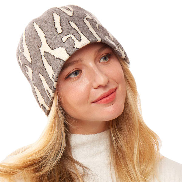 Gray Animal Patterned Soft Fabric Bucket Hat. Show your trendy side with this chic animal print hat. Have fun and look Stylish. Great for covering up when you are having a bad hair day, perfect for protecting you from the sun, rain, wind, snow, beach, pool, camping or any outdoor activities.