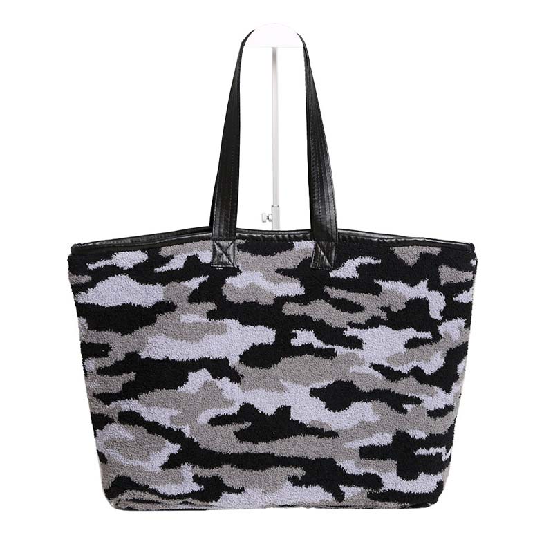 Gray Camouflage Tote Bag, be gorgeous and make an individual statement of fashion with this beautiful tote bag. It will be your new favorite accessory to hold onto all your items altogether in one place. The top zipper keeps everything secure and safe. It's easy to carry, and lightweight to run errands or a night out on the town. It's an excellent gift for Birthdays, holidays, Christmas, New Year, etc. for your friends, family, and the persons you love and care for. Keep yourself gorgeous and trendy!