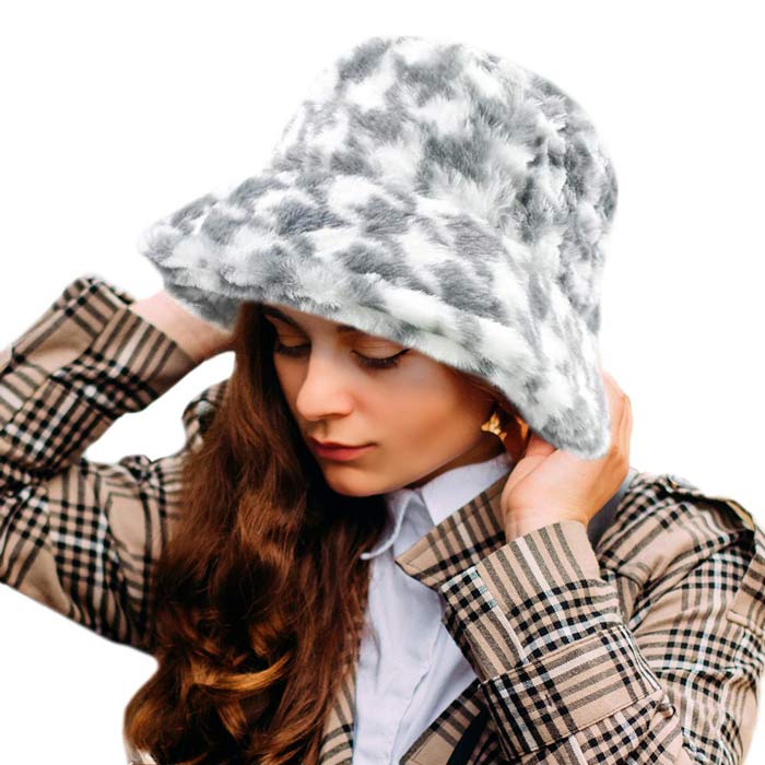 Gray Houndstooth Patterned Faux Fur Bucket Hat, This Faux Fur bucket hat is nicely designed and a great addition to your attire. Have fun and look stylish anywhere outdoors. Great for covering up when you are having a bad hair day. Perfect for protecting you from the wind, snow, beach, pool, camping, or any outdoor activities in cold weather. This classic style is lightweight and practical, perfect for all occasions at lunches, picnics, evening dinner parties or barbeques.