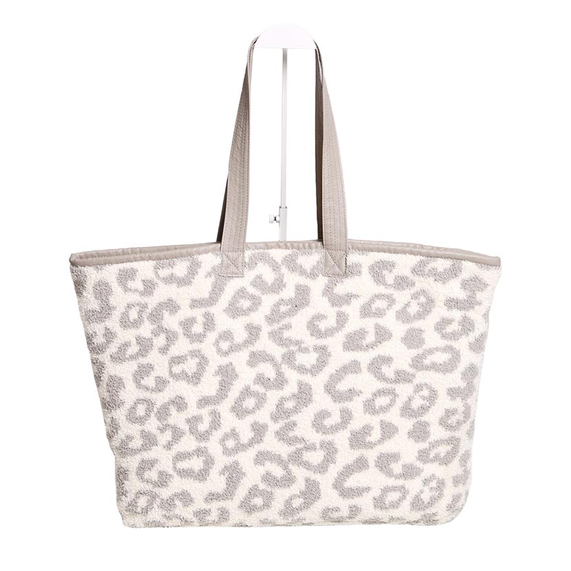 Gray Leopard Tote Bag, is an especially designed tote bag to make you stand out in perfect style. It enriches your gorgeousness and looks stylish. This Leopard-themed bag is Versatile enough for wearing straight through the week. perfectly lightweight to carry around all day. The best way to carry all of your necessary things altogether.
