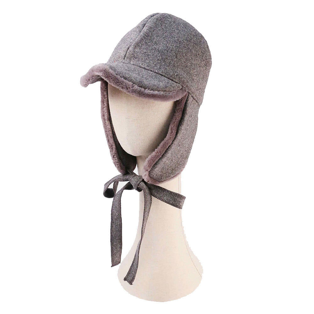 Wool Trapper Ribbon Closure Hat Wool-Blend Trapper hat boasting a ribbon-strap with soft fur is very comfortable winter hat, it’s plush Ear Flaps will keep you so warm in the coldest weather. Tie your winter wardrobe together with this wool Trapper Hat! Perfect Gift Birthday, Christmas, Holiday, Anniversary, etc.