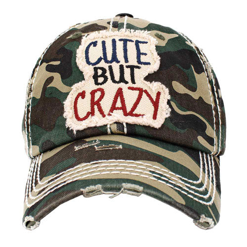 Green Cute But Crazy Message Camouflage Vintage Baseball Cap. This adorable and classic cap combines both colourful styles to turn your head and comfort for your all-day wear. perfect to keep your hair away from you face while exercising, running, playing tennis or just taking a walk outside. Adjustable Velcro strap gives you the perfect fit.