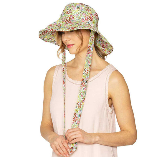 Green Flower Patterned Chin Tie Bucket Hat. Let your love for Summer bloom with these Bucket Hat. Packable and super convenient to carry, can also be easily carried inside your bags. Perfect for protecting you on a hot Summer day at the beach or keeping cool on the streets all while having your style completely intact!